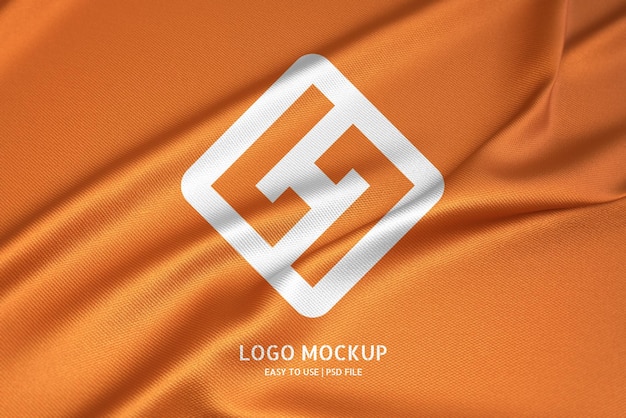 PSD logo-modell auf orangefarbenem stoff