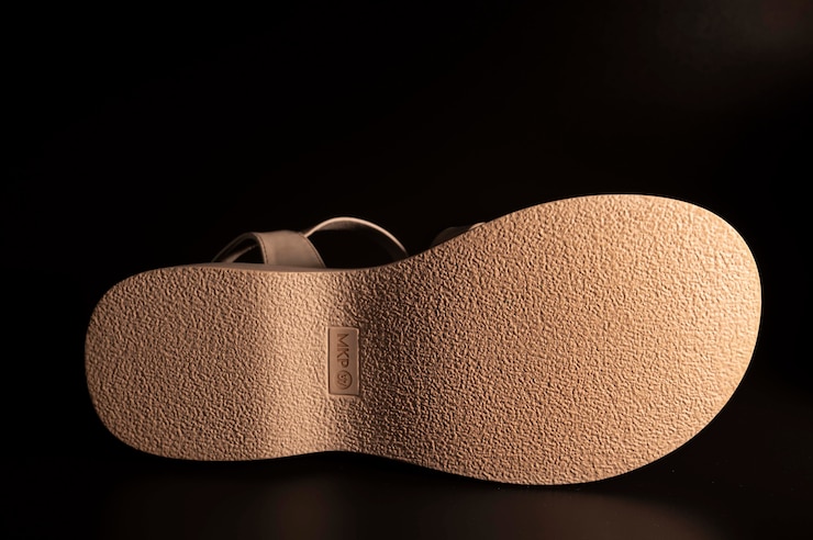 PSD logotipo en el modelo de suela de zapato