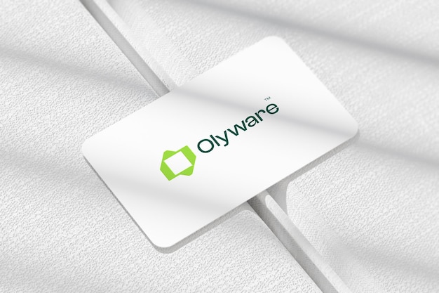 El logotipo de Olyware en la maqueta de la tarjeta de visita