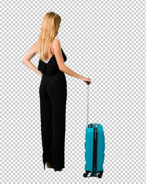 PSD loira viajando com sua mala olhando para trás