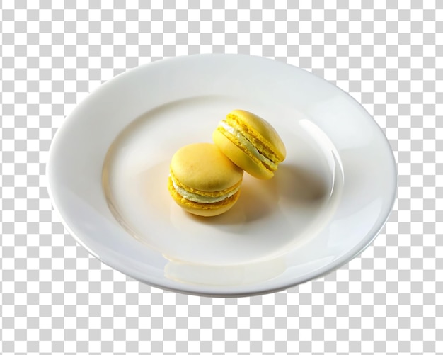 PSD macarons jaunes sur plaque blanche isolée sur un fond transparent