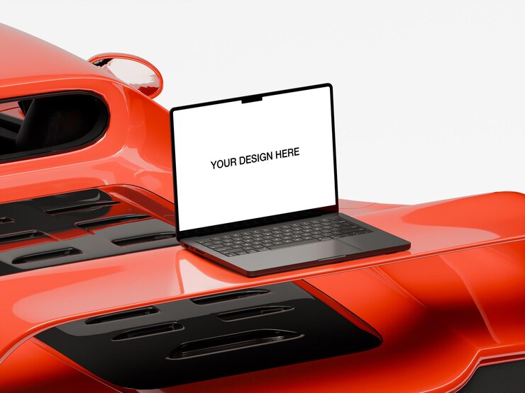 PSD macbook laptop mockup en un automóvil deportivo naranja que muestra tecnología