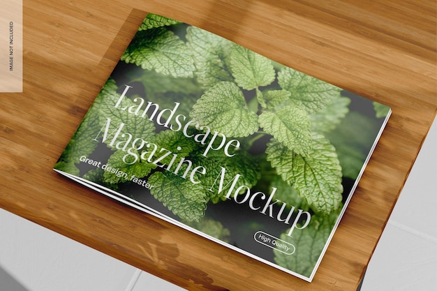 PSD le magazine paysage sur la table mockup vue gauche