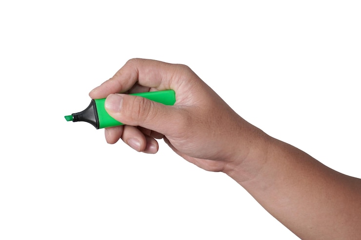 PSD male person hand holding highlighter pen writing position cut out isolated