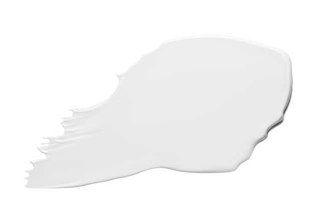 Una mancha de crema cosmética blanca sobre un fondo vacío