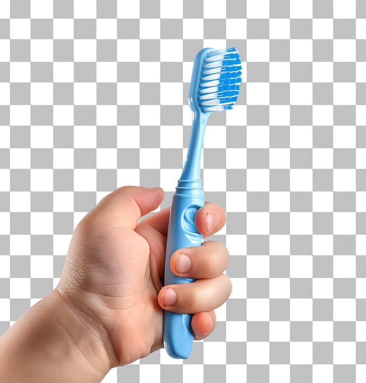 PSD la mano de un niño con un cepillo de dientes aislado sobre un fondo transparente