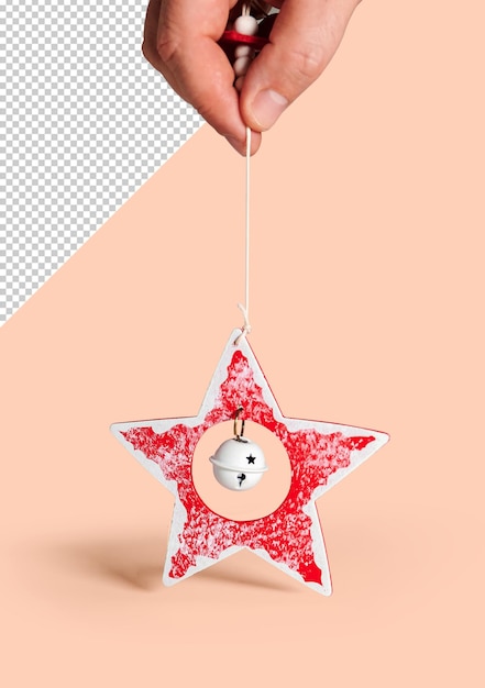 Mano sosteniendo una estrella de navidad, maqueta