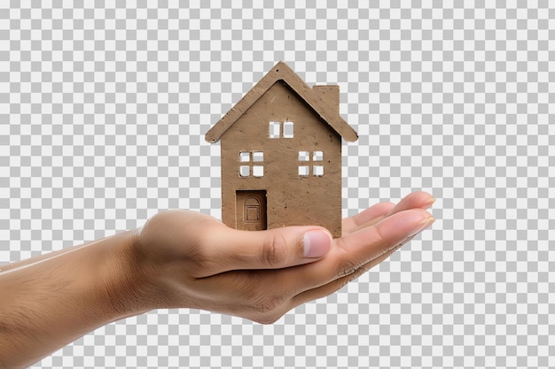 Mano sosteniendo una pequeña casa simple en un fondo transparente aislado