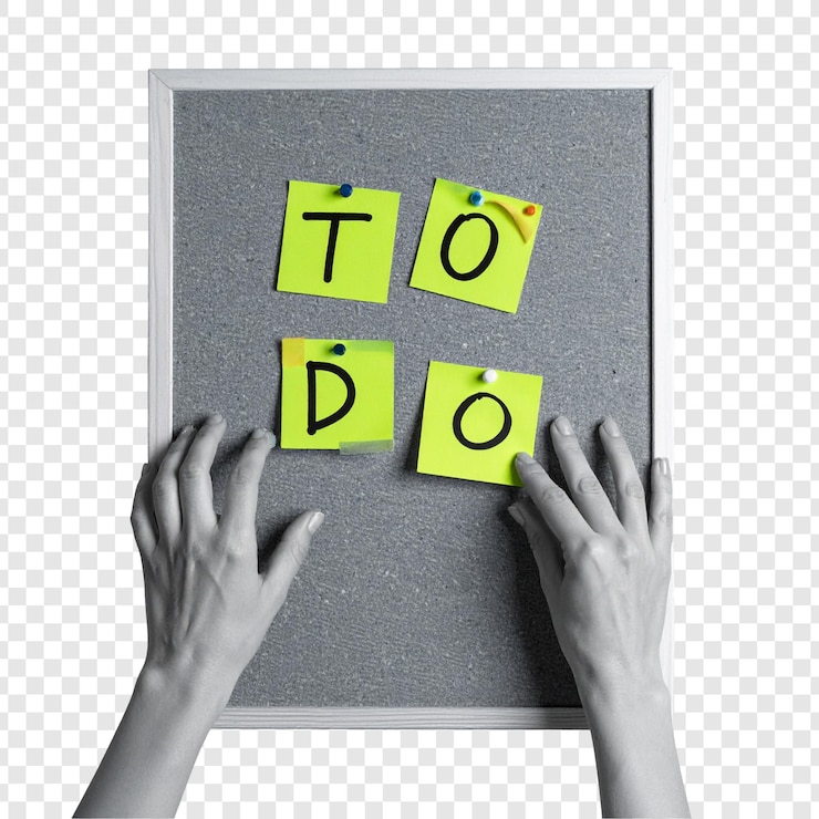 PSD manos colocando notas adhesivas para hacer una lista en un tablón de anuncios gris