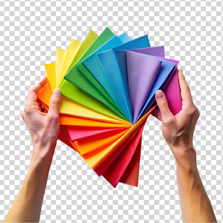 PSD manos doblando papel de colores aislado sobre un fondo transparente