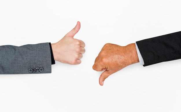 Manos humanas pulgar hacia arriba pulgar hacia abajo concepto de signo