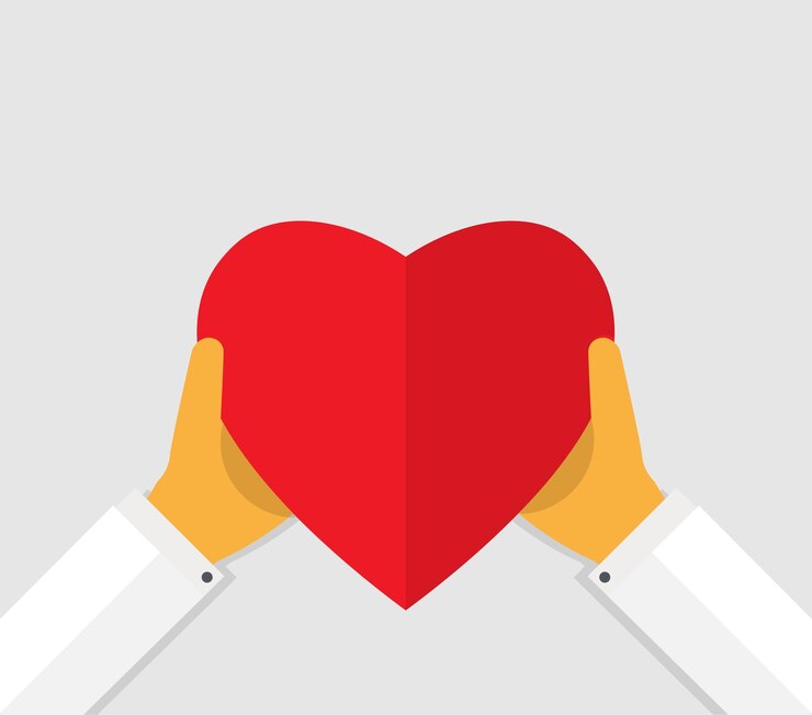 PSD manos que sostienen un corazón rojo