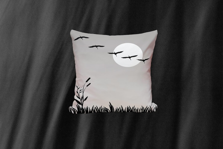PSD maqueta de almohada gris con diseño de pájaro negro
