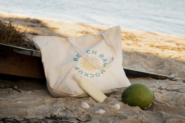 PSD maqueta de bolsa de playa en arena