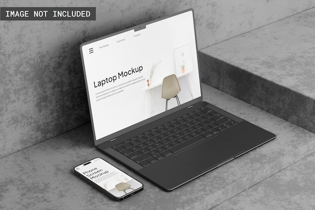 Maqueta de computadora portátil y teléfono en el piso de concreto