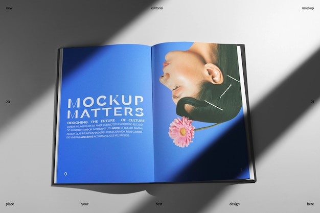 Maqueta editorial con mujer y flor en la página azul