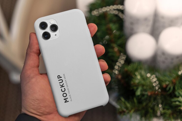 PSD maqueta de funda blanca de iphone 11 en la mesa