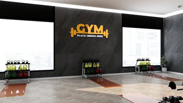 Maqueta del logo del gimnasio dorado en el gimnasio