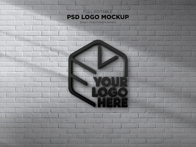PSD maqueta de logo negro en pared de ladrillo blanco