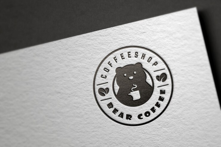 Maqueta de logo de oso realista sobre papel blanco