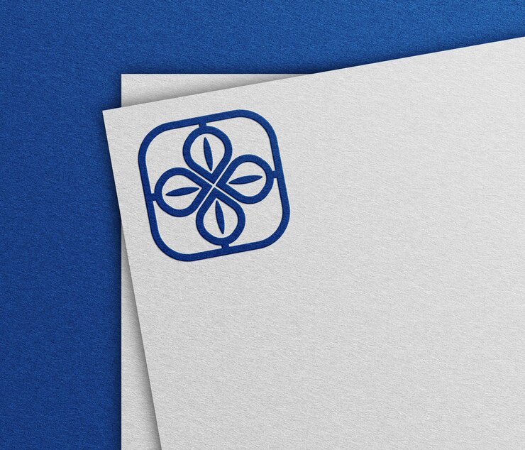 PSD maqueta del logotipo azul en papel blanco