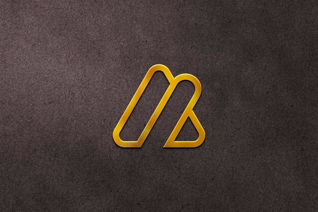 Maqueta de logotipo dorado con fondo de textura grunge
