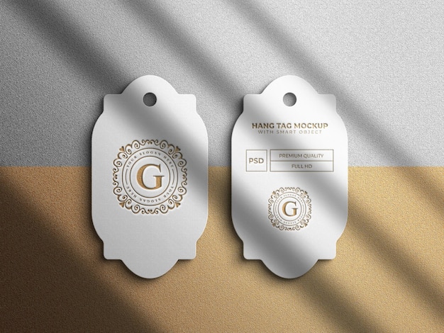 Maqueta de logotipo de etiqueta colgante de lujo con efecto en relieve y grabado