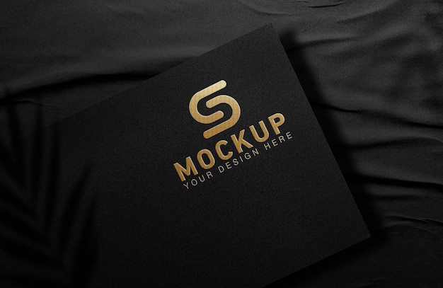 Maqueta de logotipo de lujo maqueta de logotipo dorado 3d en papel negro