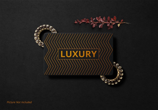 Maqueta de logotipo de lujo papel negro lámina de oro