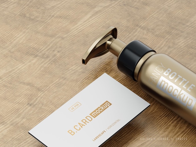 Maqueta de logotipo de lujo en tarjeta de visita y botella cosmética con efectos de lámina