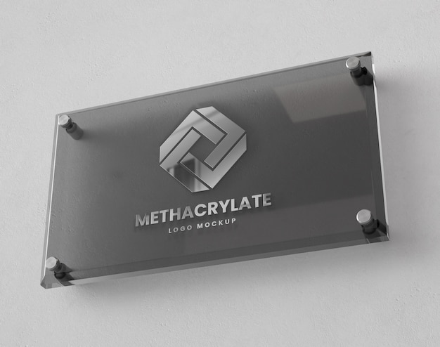 Maqueta del logotipo de metacrilato en la pared