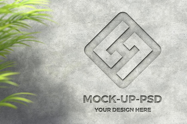 Maqueta de logotipo en muro de hormigón