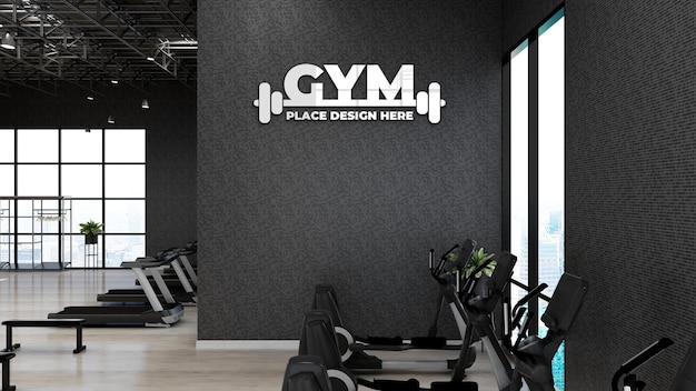 Maqueta de logotipo de pared de gimnasio en la sala de fitness o gimnasio de atleta con pared negra