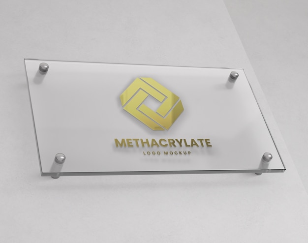 PSD maqueta del logotipo en la placa de identificación de metacrilato