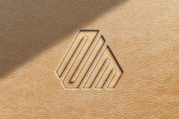 Maqueta de logotipo en relieve sobre cuero