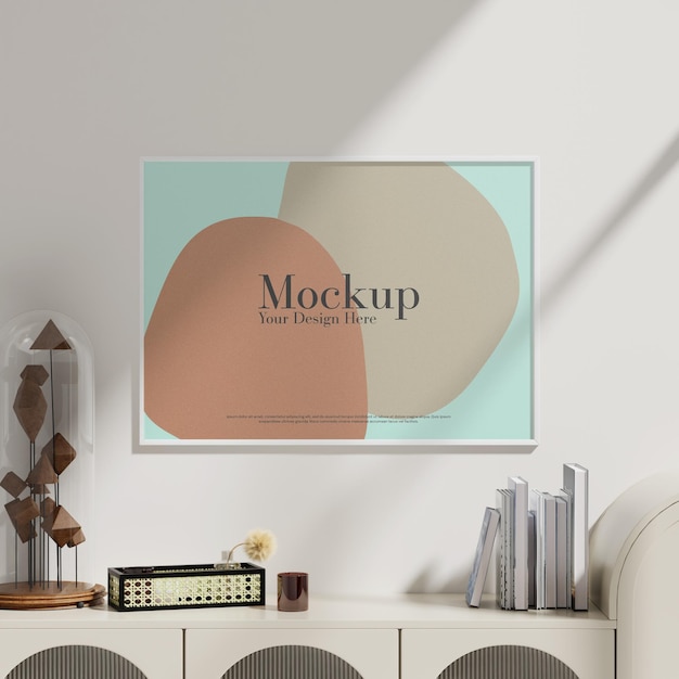 Maqueta de marco vacío y mesa de escritorio en la sala de estar