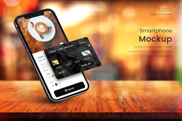PSD maqueta premium de iphone 13 y tarjeta de crédito con café borroso en el fondo