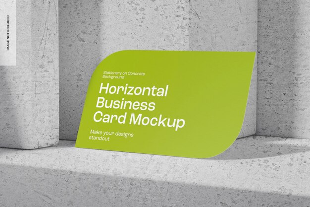 Maqueta de Tarjeta de Presentación Horizontal sobre Fondo de Concreto, Inclinada