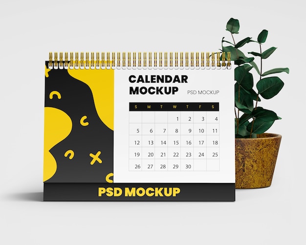 PSD maquete de calendário de mesa em espiral com planta