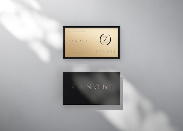 Maquete de cartão de visita moderno luxuoso em preto e dourado para identidade de marca renderização em 3D