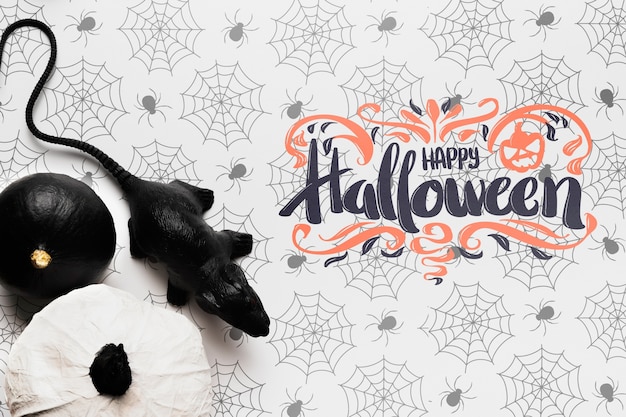 Maquete de conceito de Halloween com abóboras e ratos