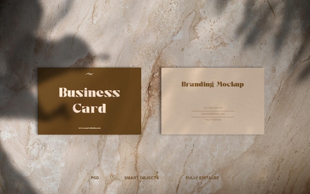 Maquete de design minimalista de cartão de visita elegante em fundo de mármore