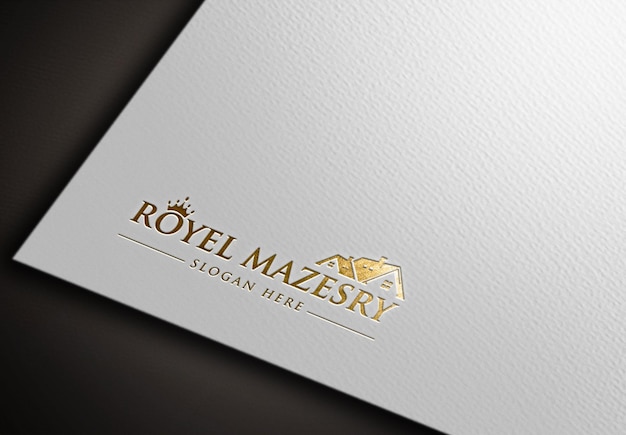 Maquete de logotipo de luxo dourado isolado em papel branco