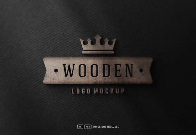 PSD maquete de logotipo de madeira 3d de luxo em papel preto texturizado