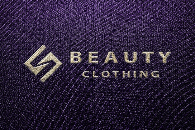 PSD maquete de logotipo de ouro frontal de remendo de roupas de relevo realista de luxo