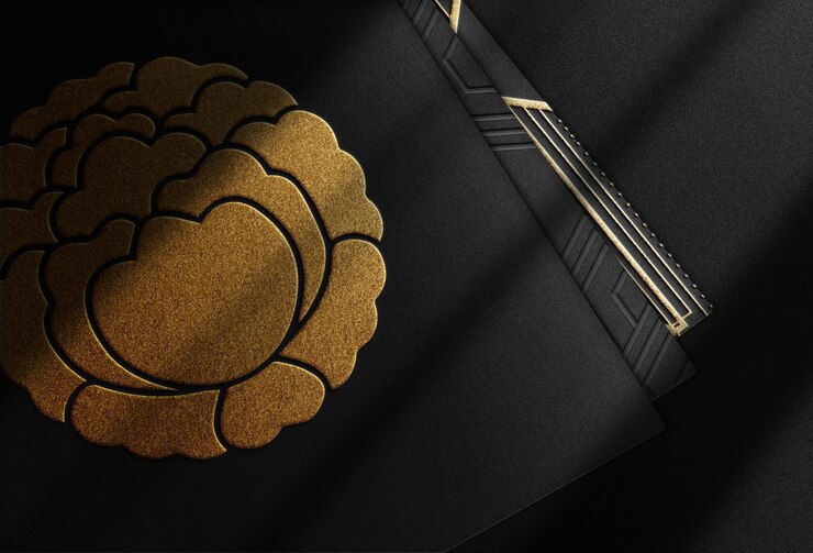PSD maquete de logotipo dourado de luxo em relevo pilha de cartão preto