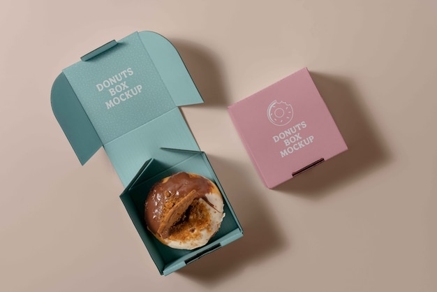 Maquete de marca de caixa de rosquinhas de estúdio de vista superior