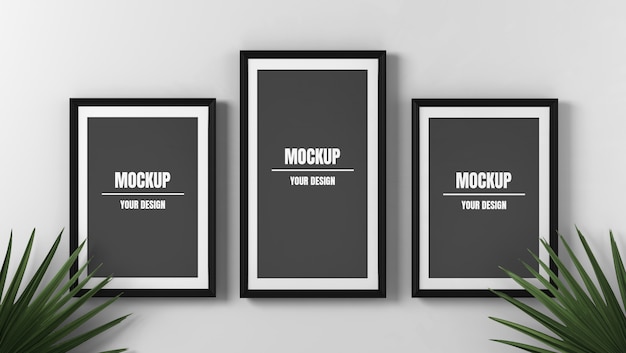 maquete de três molduras para fotos com folhas no fundo branco