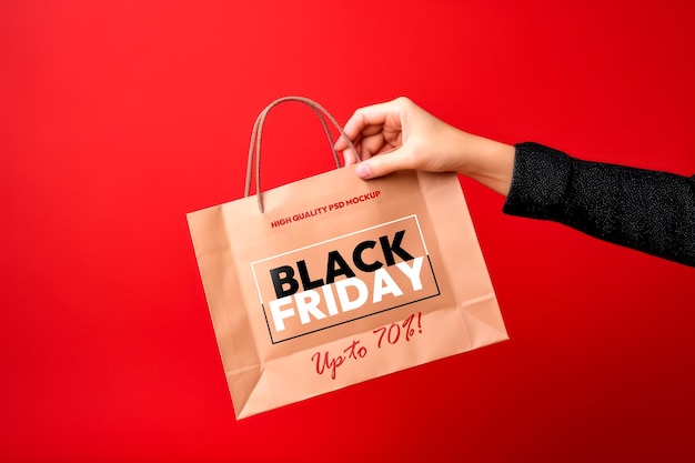 PSD maquete de uma sacola de compras de papel com design da black friday