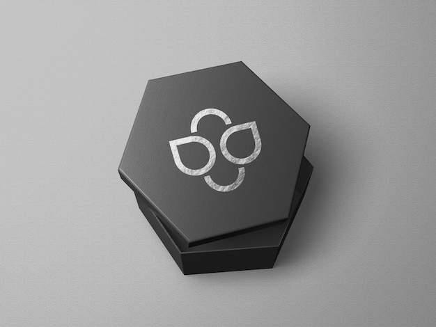 PSD maquete do logotipo em caixa em forma de hexágono com estampa prateada